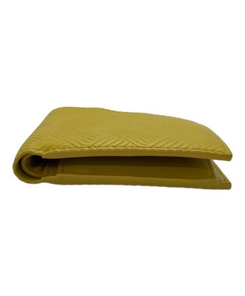 BOTTEGA VENETA（ボッテガベネタ）BOTTEGA VENETA (ボッテガベネタ) デボスイントレチャート2つ折り財布 イエローの古着・服飾アイテム