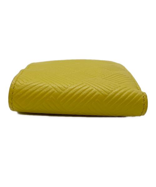 BOTTEGA VENETA（ボッテガベネタ）BOTTEGA VENETA (ボッテガベネタ) デボスイントレチャート2つ折り財布 イエローの古着・服飾アイテム