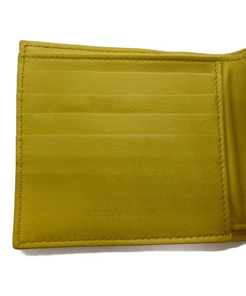 BOTTEGA VENETA（ボッテガベネタ）BOTTEGA VENETA (ボッテガベネタ) デボスイントレチャート2つ折り財布 イエローの古着・服飾アイテム