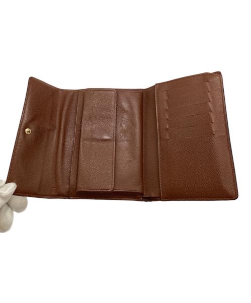 LOUIS VUITTON（ルイ ヴィトン）LOUIS VUITTON (ルイ ヴィトン) ポルトトレゾール エテュイパピエ	モノグラム　3つ折り財布 ブラウンの古着・服飾アイテム