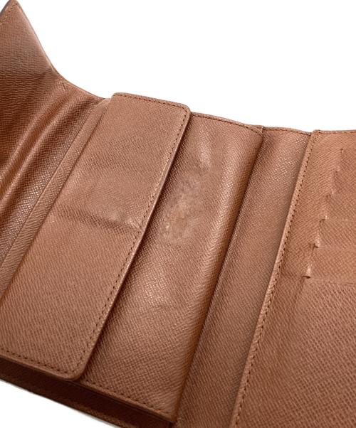 LOUIS VUITTON（ルイ ヴィトン）LOUIS VUITTON (ルイ ヴィトン) ポルトトレゾール エテュイパピエ	モノグラム　3つ折り財布 ブラウンの古着・服飾アイテム