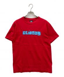 stussy（ステューシー）の古着「プリントTシャツ」｜レッド