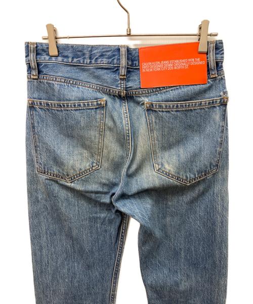 Calvin Klein Jeans（カルバンクラインジーンズ）Calvin Klein Jeans (カルバンクラインジーンズ) テーパードデニムパンツ　ボタンフライ インディゴ サイズ:71cm (W28)の古着・服飾アイテム