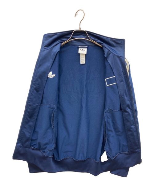 adidas（アディダス）adidas (アディダス) oasis (オアシス) ツアー ファイヤーバード トラックトップ ネイビー サイズ:Mの古着・服飾アイテム