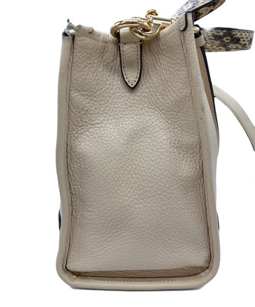 COACH（コーチ）COACH (コーチ) Jean-Michel Basquiat (ジャン ミシェル バスキア) デンプシー キャリーオール コラボ 2WAYショルダーバッグ ベージュの古着・服飾アイテム