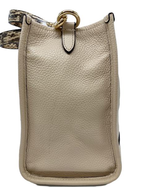 COACH（コーチ）COACH (コーチ) Jean-Michel Basquiat (ジャン ミシェル バスキア) デンプシー キャリーオール コラボ 2WAYショルダーバッグ ベージュの古着・服飾アイテム