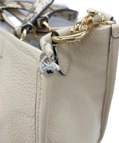 COACH（コーチ）COACH (コーチ) Jean-Michel Basquiat (ジャン ミシェル バスキア) デンプシー キャリーオール コラボ 2WAYショルダーバッグ ベージュの古着・服飾アイテム