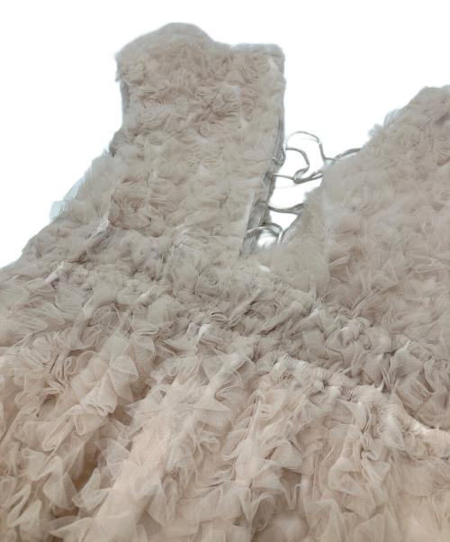 polaura（ポロ―ラ）polaura (ポロ―ラ) フラワーペプラムバックリボンチュニック ピンク サイズ:FREEの古着・服飾アイテム