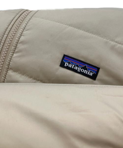 Patagonia（パタゴニア）Patagonia (パタゴニア) キッズ・リバーシブル・レディ・フレディ・フーディ ベージュ サイズ:不明の古着・服飾アイテム