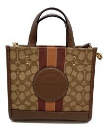 COACH（コーチ）の古着「デンプシー トート 22 シグネチャー　2WAYショルダーバッグ」｜ブラウン