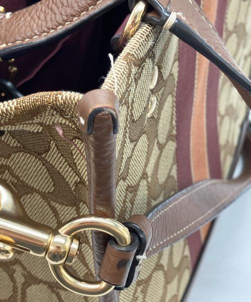 COACH（コーチ）COACH (コーチ) デンプシー トート 22 シグネチャー　2WAYショルダーバッグ ブラウンの古着・服飾アイテム