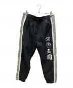 Mastermind WORLD×MITCHELL & NESSマスターマインド ワールド×ミッチェルアンドネス）の古着「別注トラックパンツ」｜ブラック