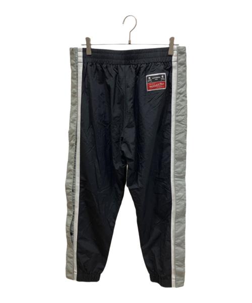 Mastermind WORLD（マスターマインド ワールド）Mastermind WORLD (マスターマインド ワールド) MITCHELL & NESS (ミッチェルアンドネス) 別注トラックパンツ ブラック サイズ:Lの古着・服飾アイテム