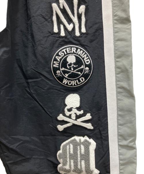 Mastermind WORLD（マスターマインド ワールド）Mastermind WORLD (マスターマインド ワールド) MITCHELL & NESS (ミッチェルアンドネス) 別注トラックパンツ ブラック サイズ:Lの古着・服飾アイテム