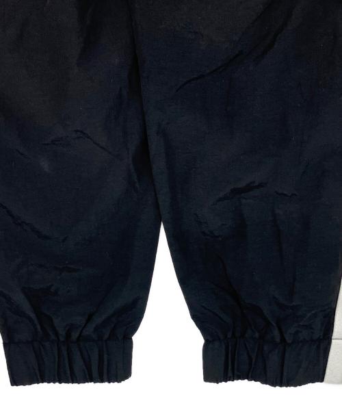 Mastermind WORLD（マスターマインド ワールド）Mastermind WORLD (マスターマインド ワールド) MITCHELL & NESS (ミッチェルアンドネス) 別注トラックパンツ ブラック サイズ:Lの古着・服飾アイテム