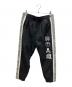 Mastermind WORLD（マスターマインド ワールド）の古着「別注トラックパンツ」｜ブラック