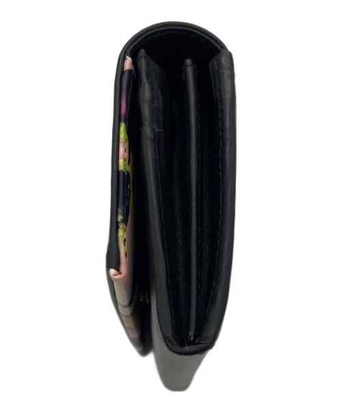 PAUL SMITH（ポールスミス）PAUL SMITH (ポールスミス) 花柄スワールトリム ブラックの古着・服飾アイテム