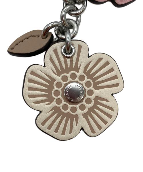 COACH（コーチ）COACH (コーチ) ティーローズモチーフ バッグチャーム ピンク×ベージュの古着・服飾アイテム