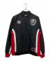 Mastermind world（マスターマインド ワールド）の古着「WARM UP JACKET コラボジャケット」｜ブラック×レッド