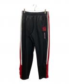 MITCHELL & NESSミッチェルアンドネス）の古着「COLOR BLOCKED TRACK PANTS トラックパンツ」｜ブラック×レッド