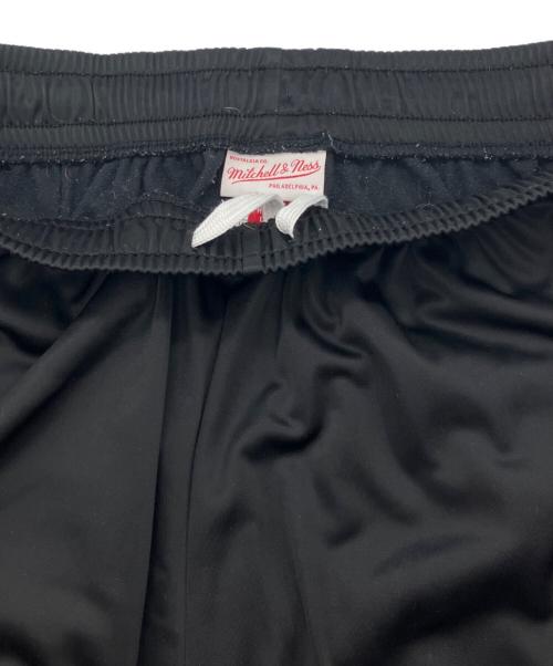 MITCHELL & NESS（ミッチェルアンドネス）MITCHELL & NESS (ミッチェルアンドネス) COLOR BLOCKED TRACK PANTS トラックパンツ ブラック×レッド サイズ:Ｍの古着・服飾アイテム
