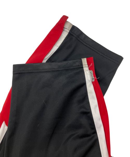 MITCHELL & NESS（ミッチェルアンドネス）MITCHELL & NESS (ミッチェルアンドネス) COLOR BLOCKED TRACK PANTS トラックパンツ ブラック×レッド サイズ:Ｍの古着・服飾アイテム