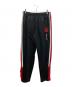 MITCHELL & NESS（ミッチェルアンドネス）の古着「COLOR BLOCKED TRACK PANTS トラックパンツ」｜ブラック×レッド