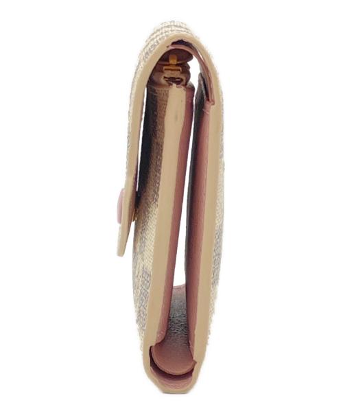 LOUIS VUITTON（ルイ ヴィトン）LOUIS VUITTON (ルイ ヴィトン) ポルトフォイユ・ヴィクトリーヌ 3つ折り財布 ベージュ×ピンクの古着・服飾アイテム