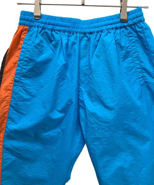 a elegantes sapeur（エレガンティス サプール）a elegantes sapeur (エレガンティス サプール) ナイロン トラック セットアップジャージ ブルー サイズ:Mの古着・服飾アイテム