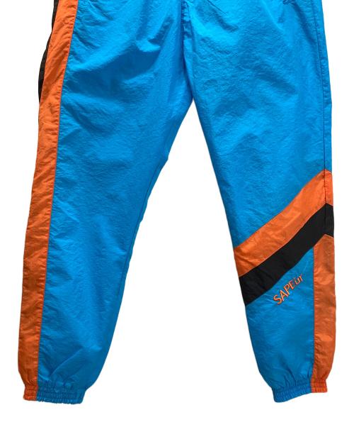 a elegantes sapeur（エレガンティス サプール）a elegantes sapeur (エレガンティス サプール) ナイロン トラック セットアップジャージ ブルー サイズ:Mの古着・服飾アイテム