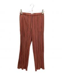 PLEATS PLEASE（プリーツプリーズ）の古着「総柄プリーツパンツ」｜レッド