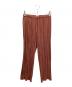 PLEATS PLEASE（プリーツプリーズ）の古着「総柄プリーツパンツ」｜レッド
