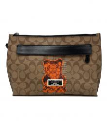 COACH（コーチ）の古着「クラッチバッグ」｜ブラウン