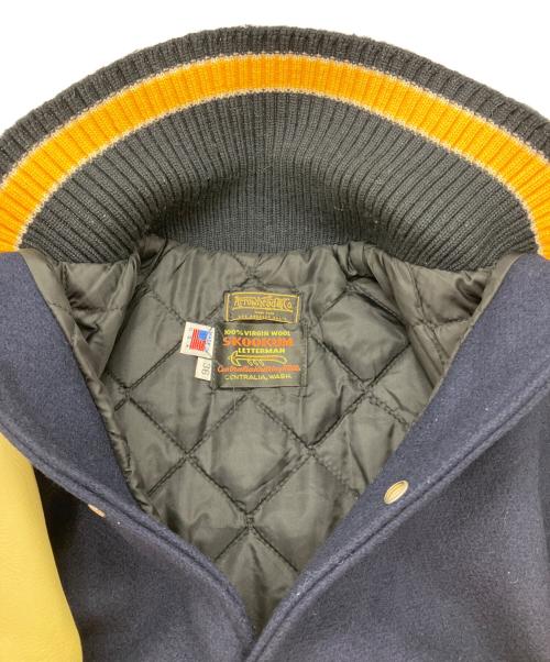 skookum（スクーカム）skookum (スクーカム) ARROWHEAD (アローヘッド) アワードジャケット ネイビー×イエロー サイズ:Sの古着・服飾アイテム