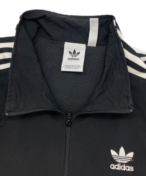 adidas（アディダス）adidas (アディダス) LOCK UP TRACK TOP トラックジャケット ブラック サイズ:Mの古着・服飾アイテム