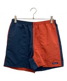 Patagonia（パタゴニア）の古着「バギーズ・ショーツ 5インチ」｜ネイビー×オレンジ