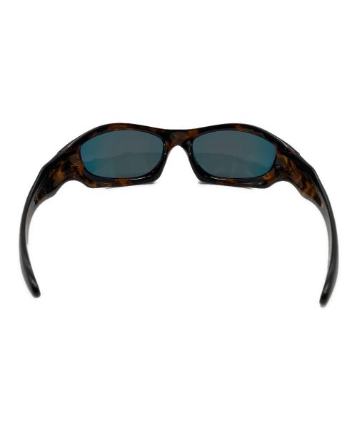 OAKLEY（オークリー）OAKLEY (オークリー) MONSTER DOG サングラス ブラウンの古着・服飾アイテム