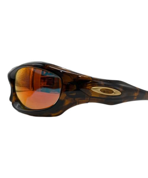 OAKLEY（オークリー）OAKLEY (オークリー) MONSTER DOG サングラス ブラウンの古着・服飾アイテム