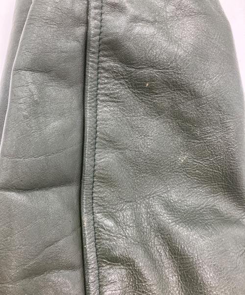FLYNNTAN LEATHER（フライングタン レザー）FLYNNTAN LEATHER (フライングタン レザー) 70S スタジャン グリーン サイズ:42の古着・服飾アイテム