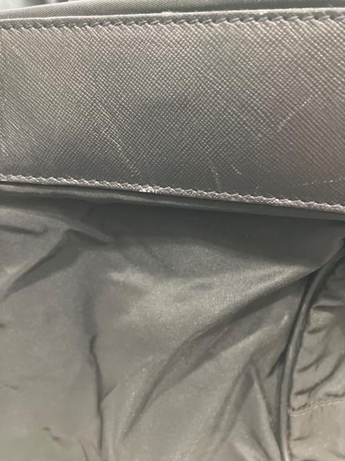PRADA（プラダ）PRADA (プラダ) ロゴ金具 ナイロンボストンバッグ ブラックの古着・服飾アイテム