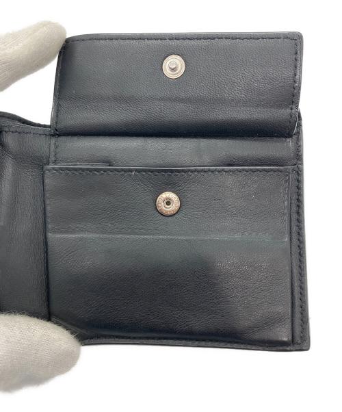 Saint Laurent Paris（サンローランパリ）Saint Laurent Paris (サンローランパリ) イーストウエスト ウォレット クロコダイルエンボス ２つ折り財布 ブラックの古着・服飾アイテム