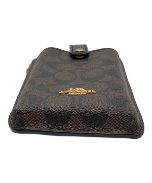 COACH（コーチ）COACH (コーチ) シグネチャー スマホポーチ ブラウンの古着・服飾アイテム