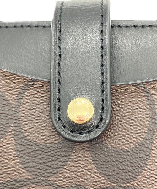COACH（コーチ）COACH (コーチ) シグネチャー スマホポーチ ブラウンの古着・服飾アイテム