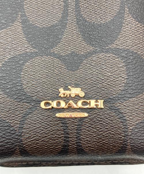 COACH（コーチ）COACH (コーチ) シグネチャー スマホポーチ ブラウンの古着・服飾アイテム