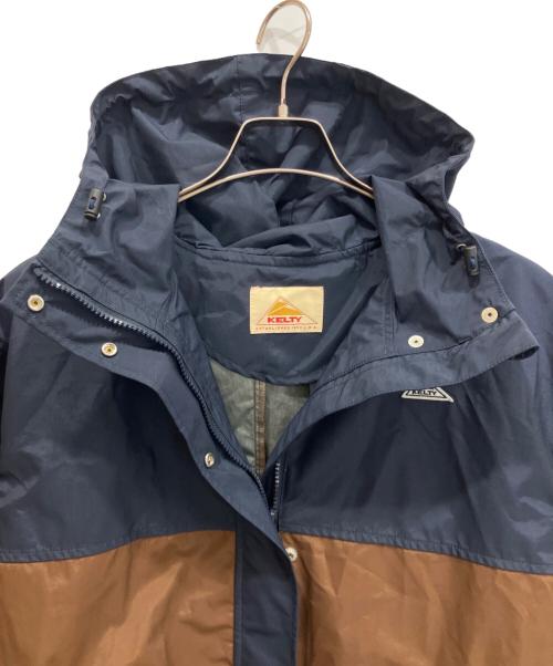 KELTY（ケルティ）KELTY (ケルティ) studio clip (スタジオクリップ) コラボマウンテンパーカー ネイビー×ブラウン サイズ:Freeの古着・服飾アイテム