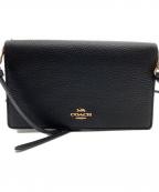 COACHコーチ）の古着「アンナ フォルドオーバー クロスボディ クラッチ」｜ブラック