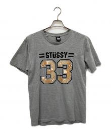 stussy（ステューシー）の古着「ナンバリングTシャツ」｜グレー
