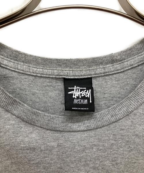 stussy（ステューシー）stussy (ステューシー) ナンバリングTシャツ グレー サイズ:Mの古着・服飾アイテム