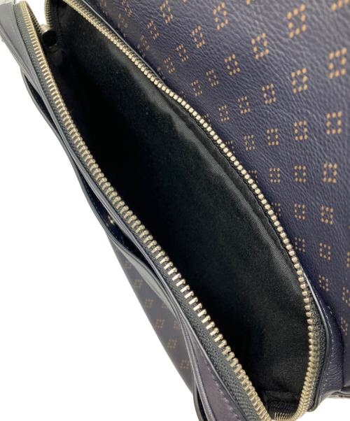 COACH（コーチ）COACH (コーチ) プリンテッドレザーリュック ネイビーの古着・服飾アイテム