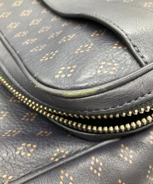 COACH（コーチ）COACH (コーチ) プリンテッドレザーリュック ネイビーの古着・服飾アイテム